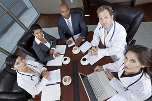 Healthcare Administrators sitting around a table