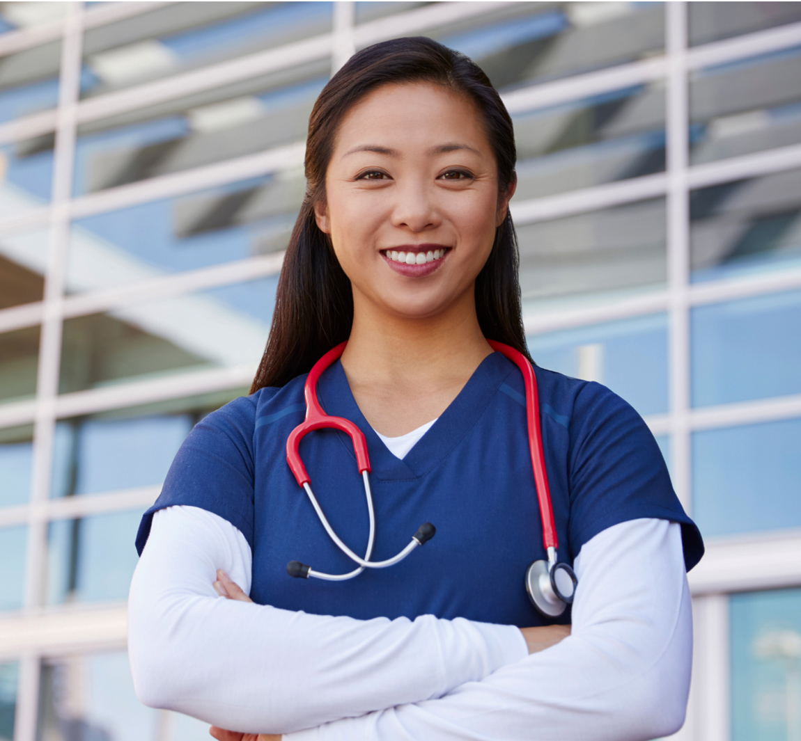 Nursing with arms crossed smiling