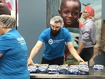 Carrington College in Mesa Volunteers to Feed Starving Children 1