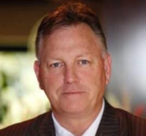 man in brown suit