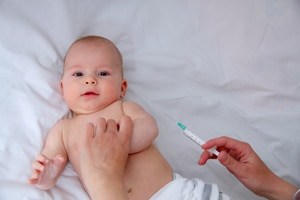 Immunizing infants is at the center of a heated debate.