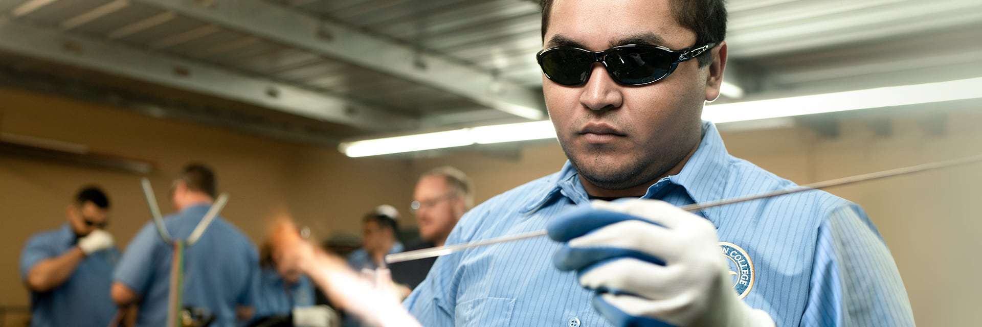 man in goggled testing hvac levels