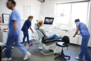 dental exam room with patient in chair