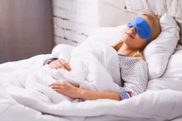 Woman Sleeping with Sleepmask Woman Sleeping with Sleepmask