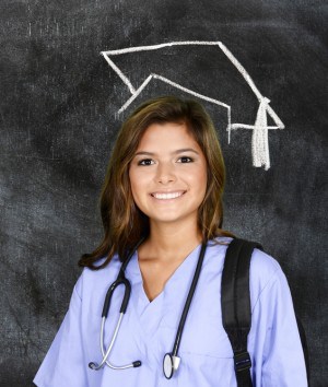 Woman in Scrubs with Chalk Drawn Graduation Cap